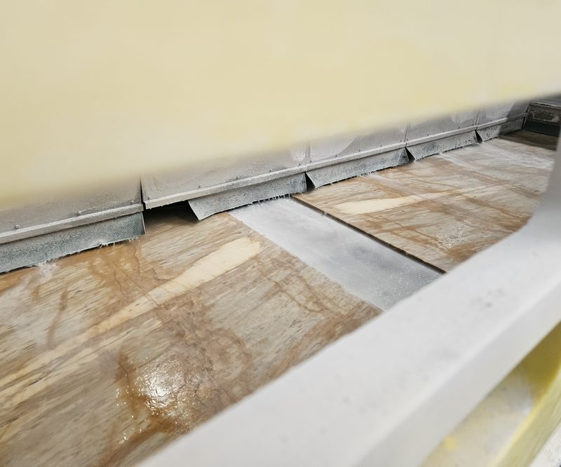 Finishing the edge — Giallo Siena marble in processing