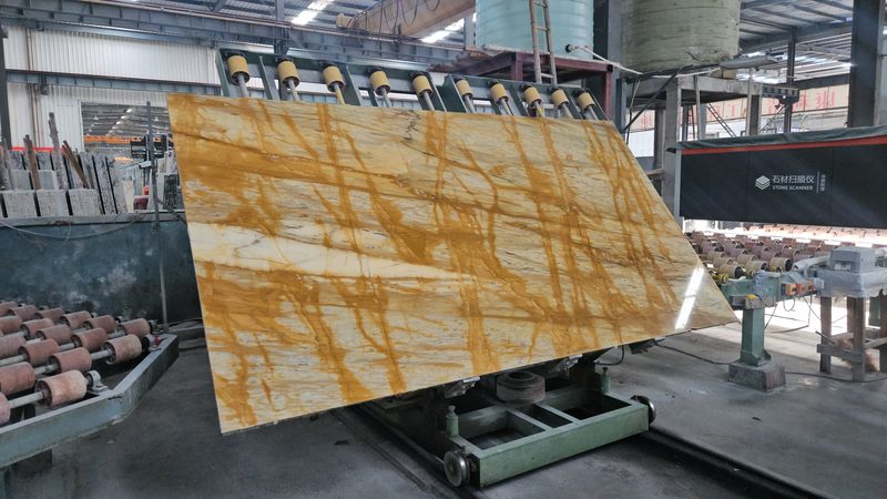 Raising the slab — Giallo Siena marble in processing