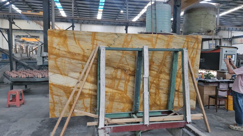 Raising the slab — Giallo Siena marble in processing