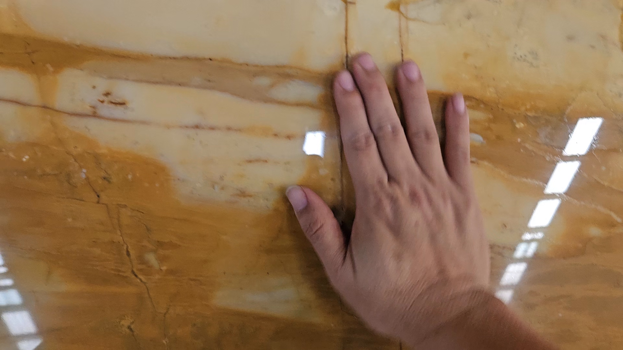 A hand on the finished surface
